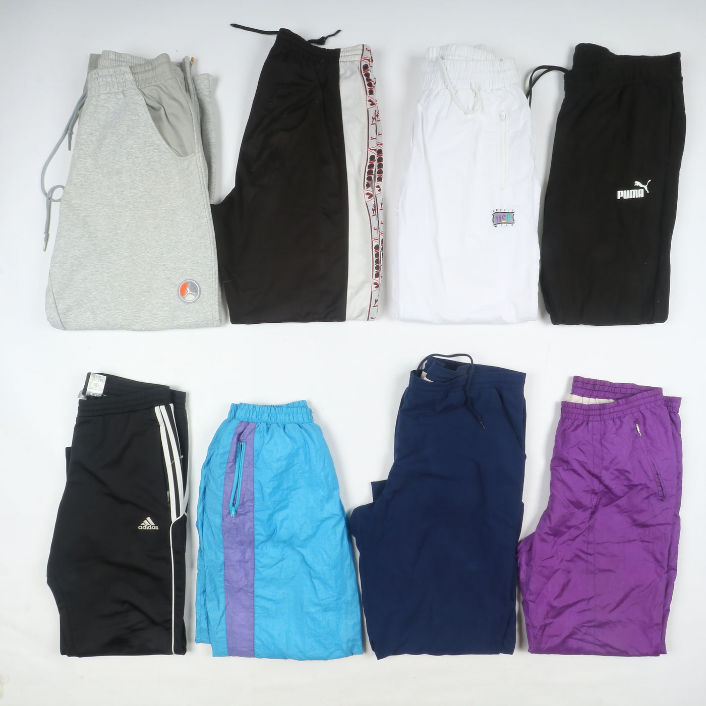 Pantaloni sportivi Adidas, Nike, Puma... uomo donna box da 38pz Grado A+B